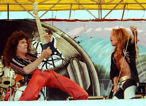 Eddie Van Halen Kramer guitar auction moment with Van Halen performing live onstage in the 1980s.