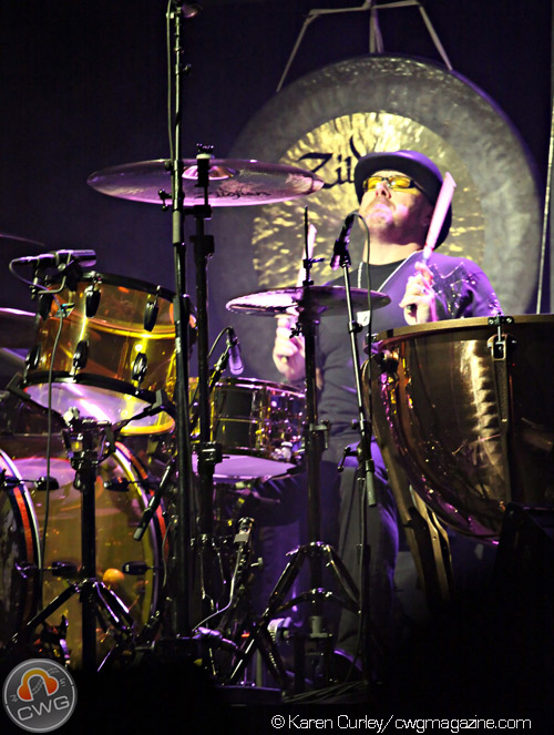 Jason Bonham's Led Zeppelin Evening Live Performance - Classic Rock Artists Jason Bonham Led Zeppelin Evening drummer performing live on stage with massive drum kit.