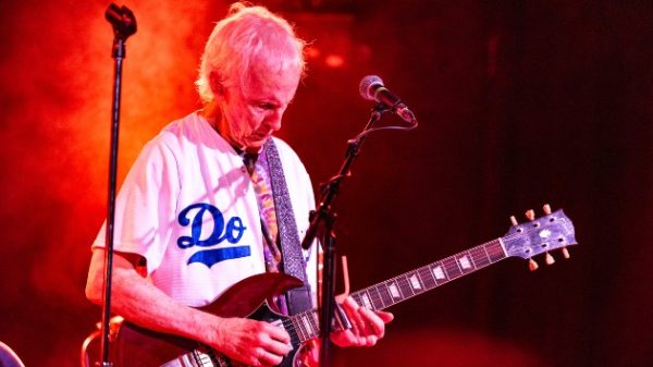 Robby Krieger Performs The Doors’ Morrison Hotel Live - Classic Rock Artists Robby Krieger of The Doors playing guitar live on stage during a tribute performance.