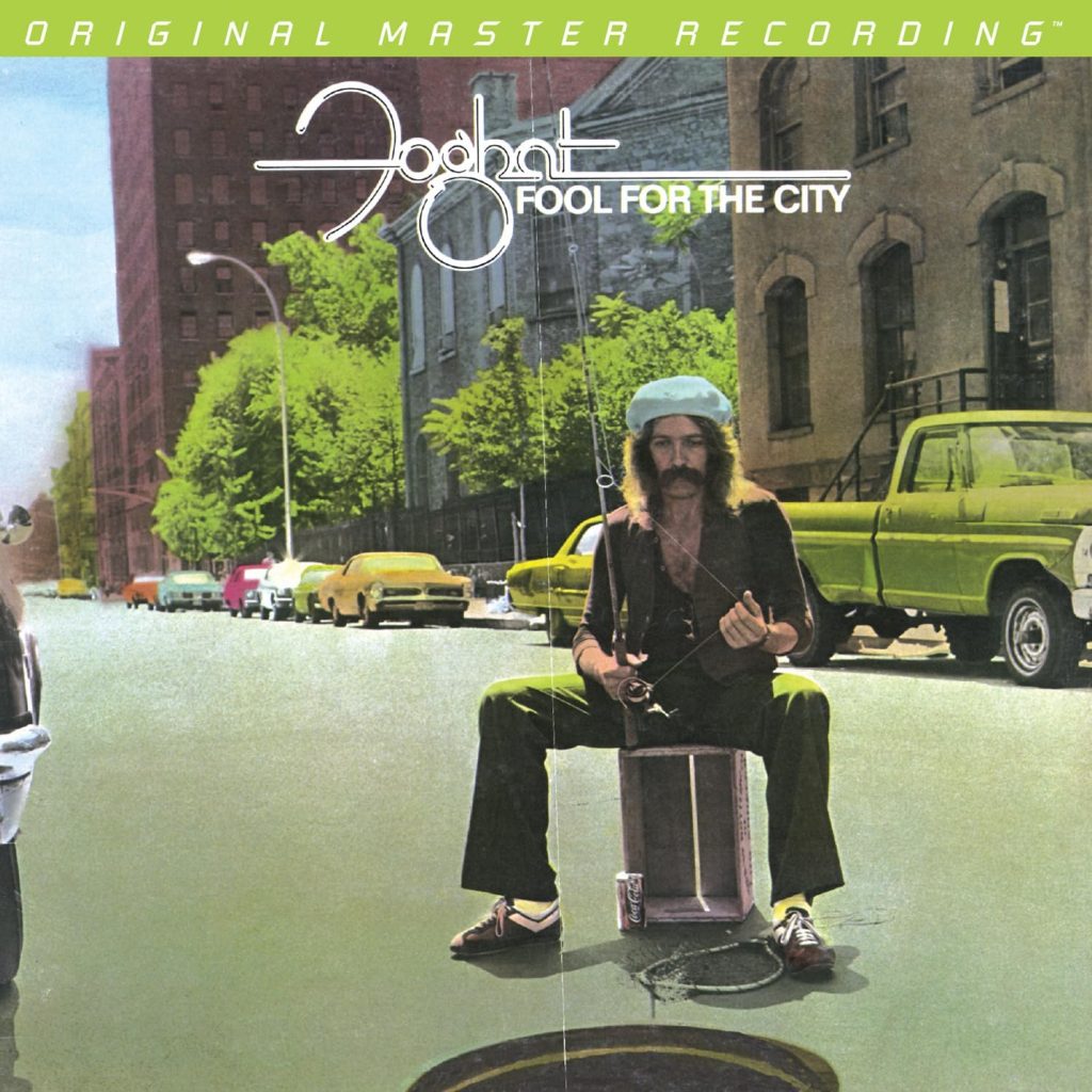 Fool for the City by Foghat Album Cover - Classic Rock Artists Foghat's "Fool for the City" album cover featuring a man fishing in a city manhole.