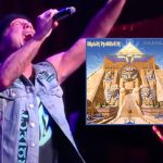 Bruce Dickinson performing live on stage as Iron Maiden vocalist