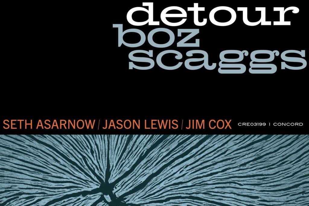 Boz Scaggs Detour Album Cover Art - October 2025 Release - Classic Rock Artists Boz Scaggs Detour Album cover featuring elegant typography on black background with blue radiating pattern.