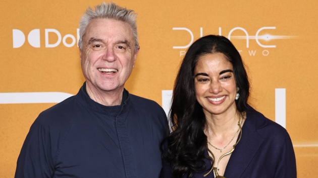 David Byrne Wedding Playlist Creator with Fiancee Mala - Classic Rock Artists David Byrne and Mala Gaonkar at Dune premiere before announcing David Byrne wedding playlist for their 2025 ceremony.