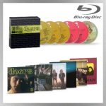 Alt Text: Doors Dolby Atmos Immersed 1967-1971 Blu-ray box set showing six colored discs and original album covers including The Doors, Strange Days, Waiting for the Sun, The Soft Parade, Morrison Hotel, and L.A. Woman