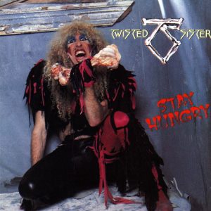 Twisted Sister Stay Hungry Album - Classic Heavy Metal - Classic Rock Artists Twisted Sister Stay Hungry album cover featuring Dee Snider in iconic 1980s glam metal makeup and costume with Twisted Sister reunion bringing back classic era nostalgia