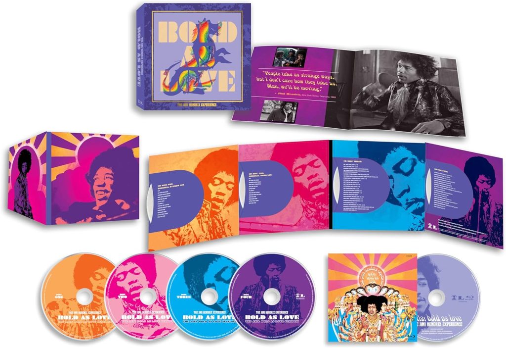 Bold As Love Deluxe Box Set Complete Contents - Classic Rock Artists Jimi Hendrix Bold As Love deluxe box set showing purple packaging, colorful vinyl records, CDs, Blu-ray disc, and psychedelic artwork booklet with rainbow Hendrix portraits.