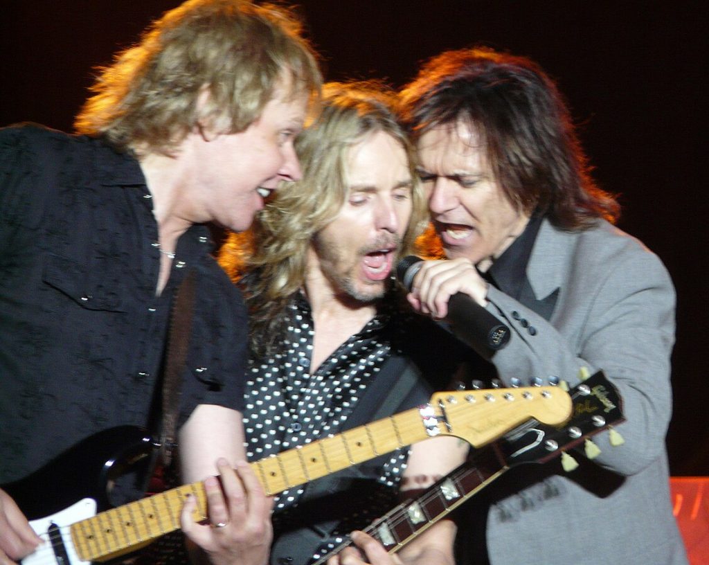 Styx band members James JY Young, Tommy Shaw, and Lawrence Gowan performing live on stage at Grand Casino in 2008.
