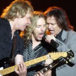 Styx band members James JY Young, Tommy Shaw, and Lawrence Gowan performing live on stage at Grand Casino in 2008.
