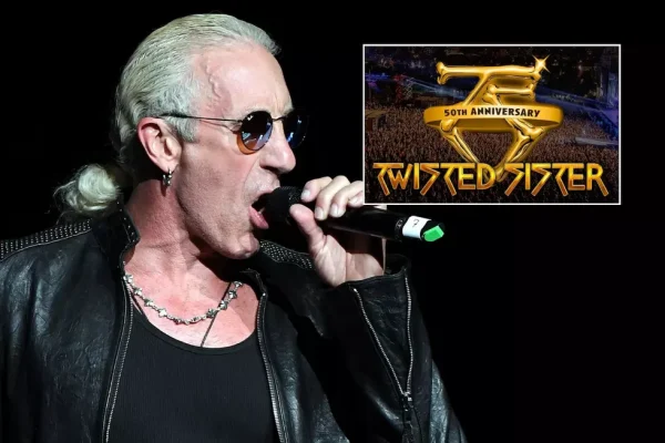 Dee Snider Twisted Sister Reunion 2026 Performance - Classic Rock Artists Dee Snider performing live on stage during Twisted Sister reunion announcement with 50th anniversary logo displayed, wearing leather jacket and sunglasses while singing into microphone.