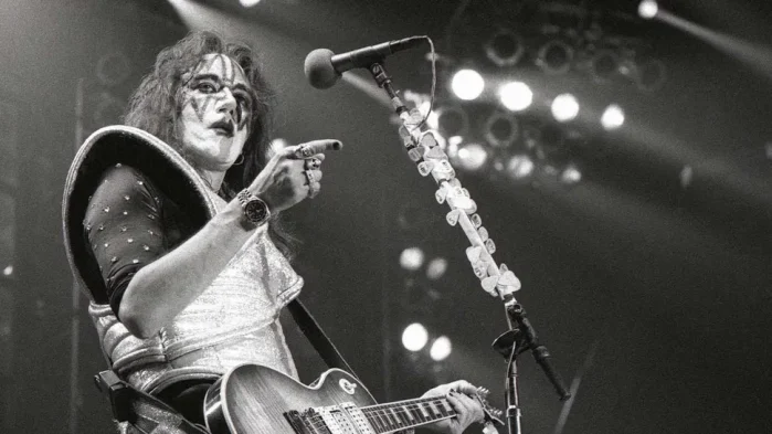 Farewell to the Spaceman - Ace Frehley performing live with KISS in his iconic silver Spaceman makeup and costume, playing his Les Paul guitar.