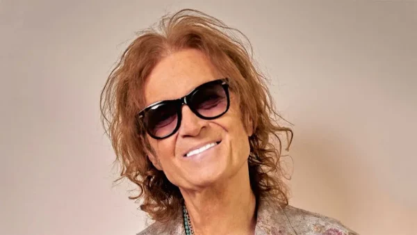 Glenn Hughes 2026 tour announcement smiling in sunglasses.