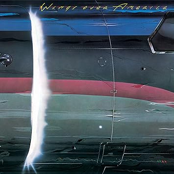 Wings Over America by Paul McCartney and Wings 1976 triple live album cover featuring stylized airplane wing with lightning bolt