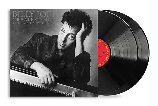 Greatest Hits Volume I & II by Billy Joel vinyl album cover featuring black and white portrait with piano