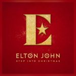 Elton John Step Into Christmas certified platinum artwork featuring gold E logo with star on festive red background.