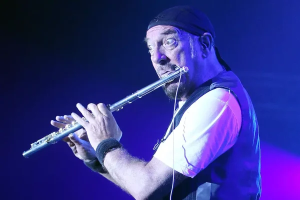Ian Anderson performing on Jethro Tull tour with signature flute playing style