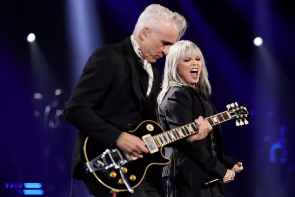 Pat Benatar and Neil Giraldo performing live