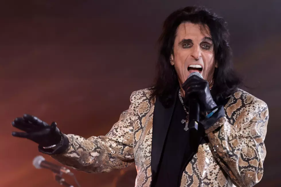 Alice Cooper tour 2026 performance showing the shock rock legend in signature stage makeup and snakeskin jacket