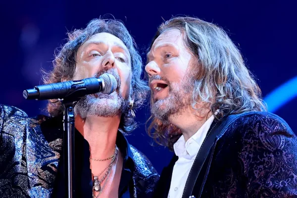 Black Crowes tour 2026 featuring Chris and Rich Robinson performing live on stage