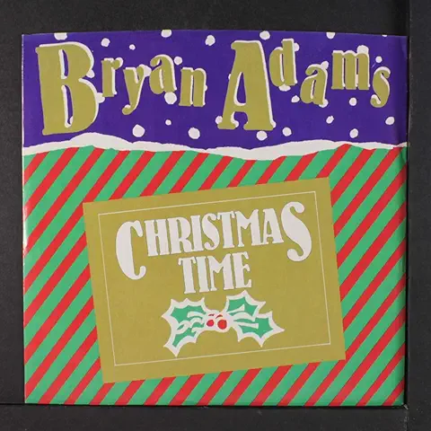 Bryan Adams Christmas Time 1985 green vinyl single cover featuring festive red and green striped design with holly decoration.