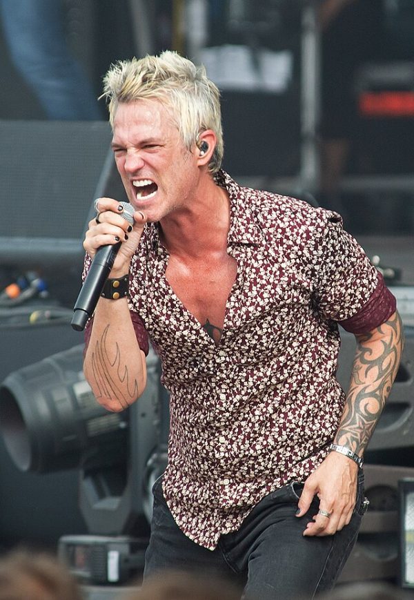 Jeff Gutt Stone Temple Pilots lead vocalist performing live on stage with microphone
