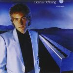 The iconic album cover for Dennis DeYoung: Desert Moon featuring a nostalgic night scene.