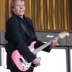 James Young performing live on stage with Styx.