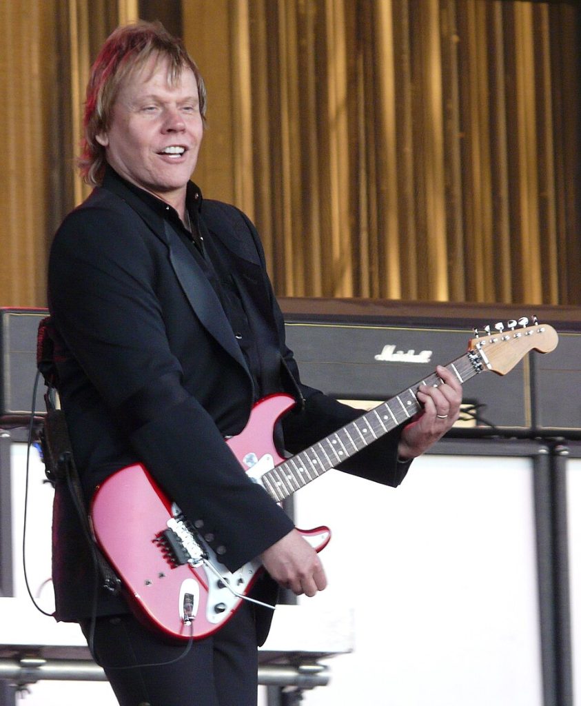 James Young performing live on stage with Styx.