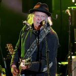 Neil Young cancels 2026 tour dates pictured performing at Light Up the Blues 7 Concert at The Greek Theatre in Los Angeles
