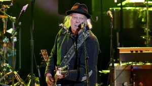 Neil Young cancels 2026 tour dates pictured performing at Light Up the Blues 7 Concert at The Greek Theatre in Los Angeles