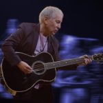 Paul Simon farewell tour dates 2026 A Quiet Celebration Tour performance acoustic guitar stage.