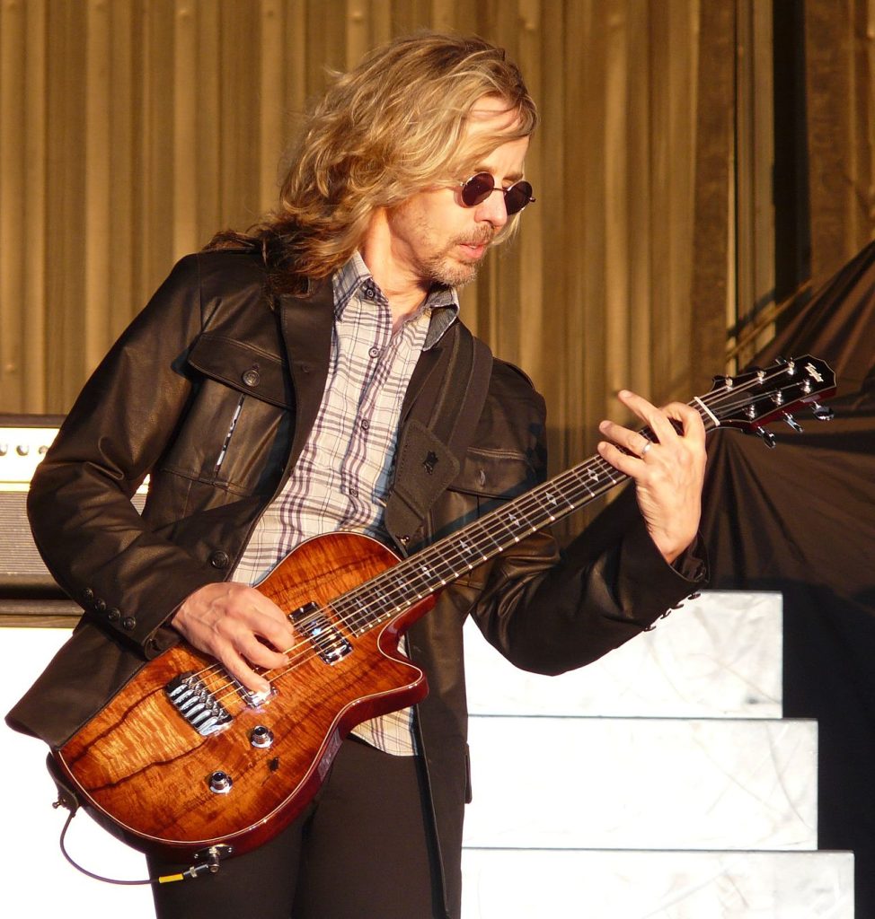 Tommy Shaw performing live on stage with Styx