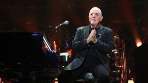 Billy Joel performing at the Billy Joel 100th MSG concert release event in New York