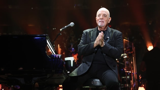 Billy Joel performing at the Billy Joel 100th MSG concert release event in New York