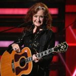 Bonnie Raitt performing live during the bonnie raitt tour.