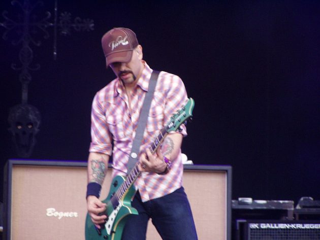 Dave Kushner performing on stage