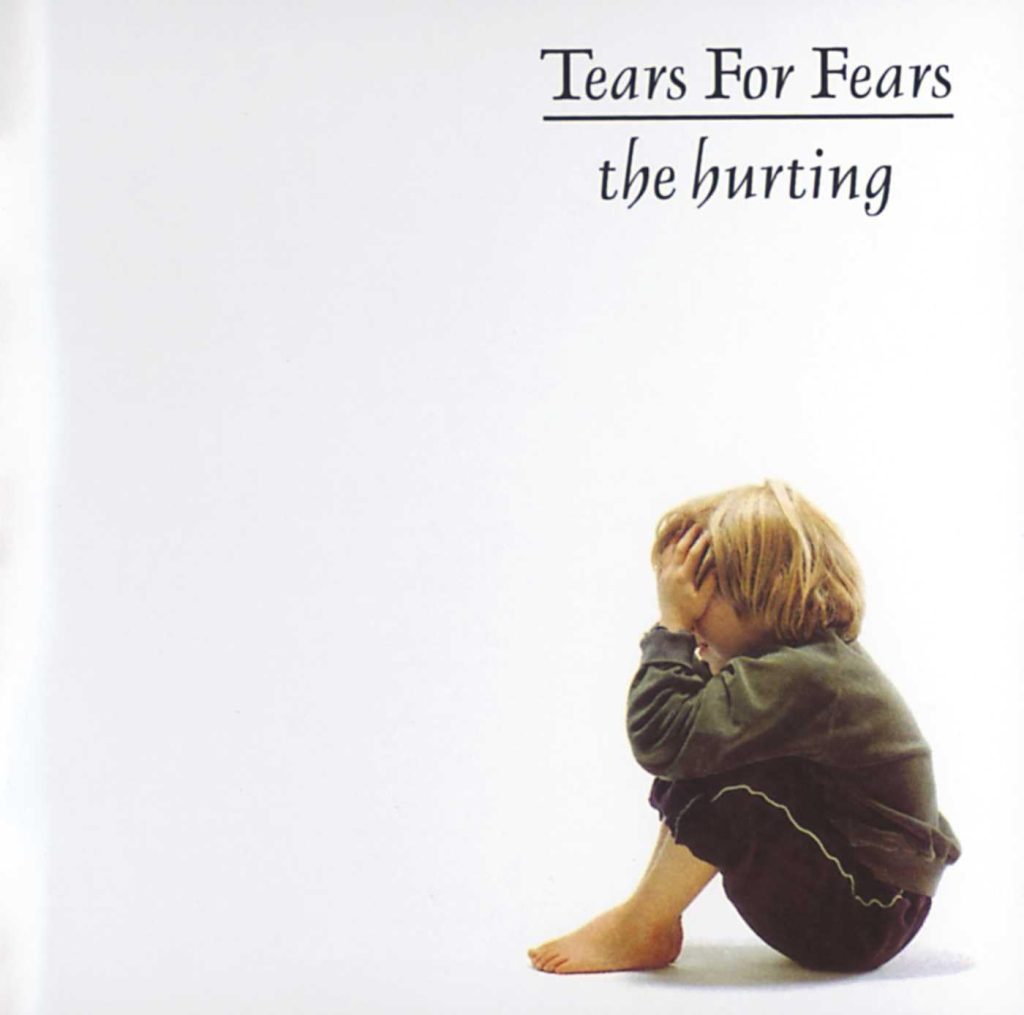 Tears for Fears The Hurting album cover featuring a child sitting alone with head in hands, symbolizing the emotion behind the song Mad World.