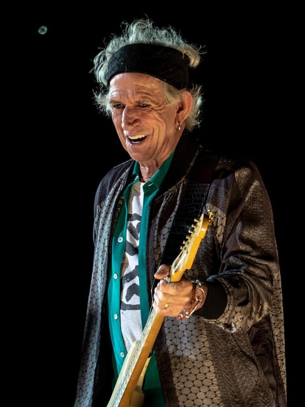 Keith Richards performing live on stage