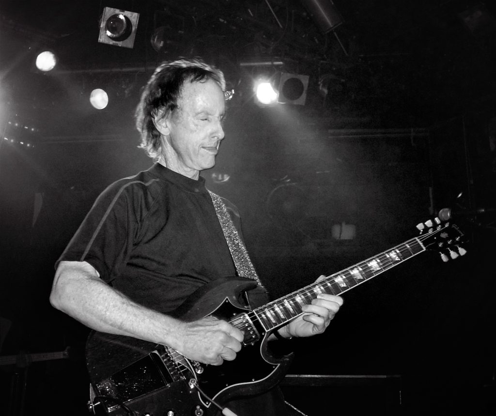 Robby Krieger performing live on stage, guitarist and songwriter of The Doors.