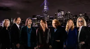 In The Eye Of The Storm Foreigner band members posing against a dramatic New York City skyline promoting their upcoming album release.