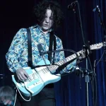 Jack White performing live on his 2026 world tour with electric guitar