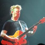 Brian Setzer playing his Gretsch guitar live on stage