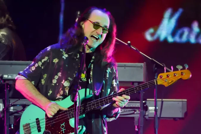 Geddy Lee: The Complete Biography of Rush's Frontman 1 Geddy Lee performing live on bass with Rush