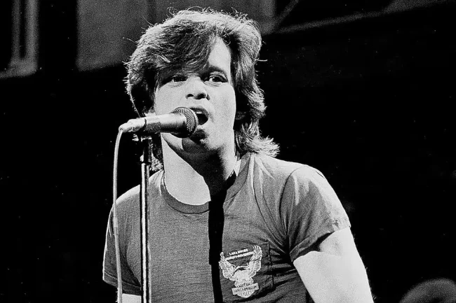John Mellencamp performing live, photo by Gary Gershoff, Getty Images