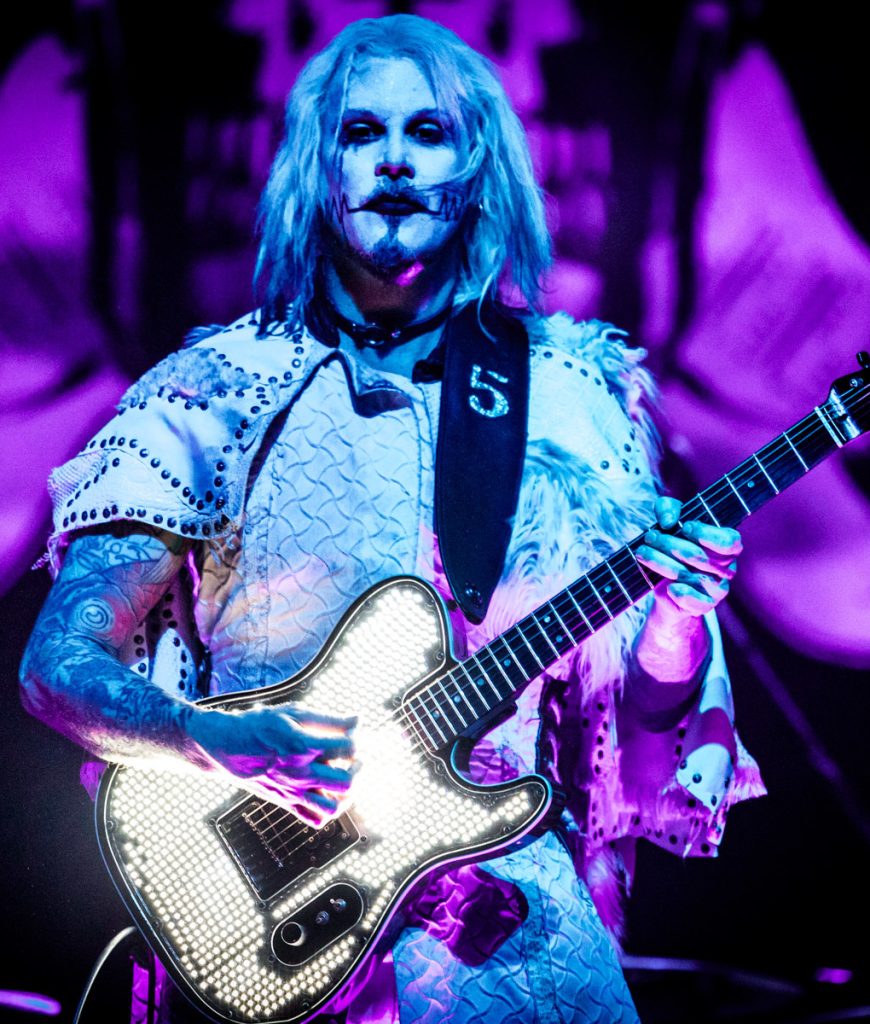 John 5: The Guitarist Behind Mötley Crüe's New Sound 12 John 5 playing guitar live on stage, lead guitarist of Mötley Crüe
