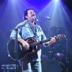 Steve Lukather performing live with his Music Man Luke signature guitar