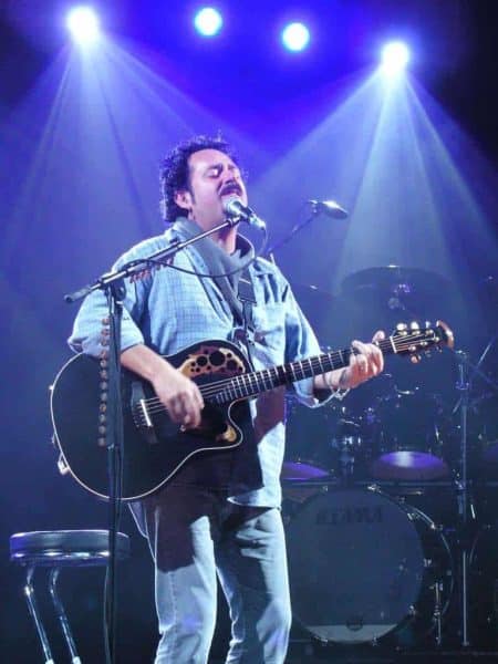 Steve Lukather performing live with his Music Man Luke signature guitar