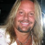 Vince Neil performing live on stage as lead vocalist of Mötley Crüe