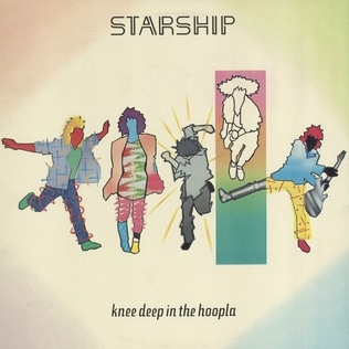 We Built This City album cover from Knee Deep in the Hoopla by Starship (1985)