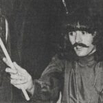 Spencer Dryden of Jefferson Airplane holding a drumstick, 1968